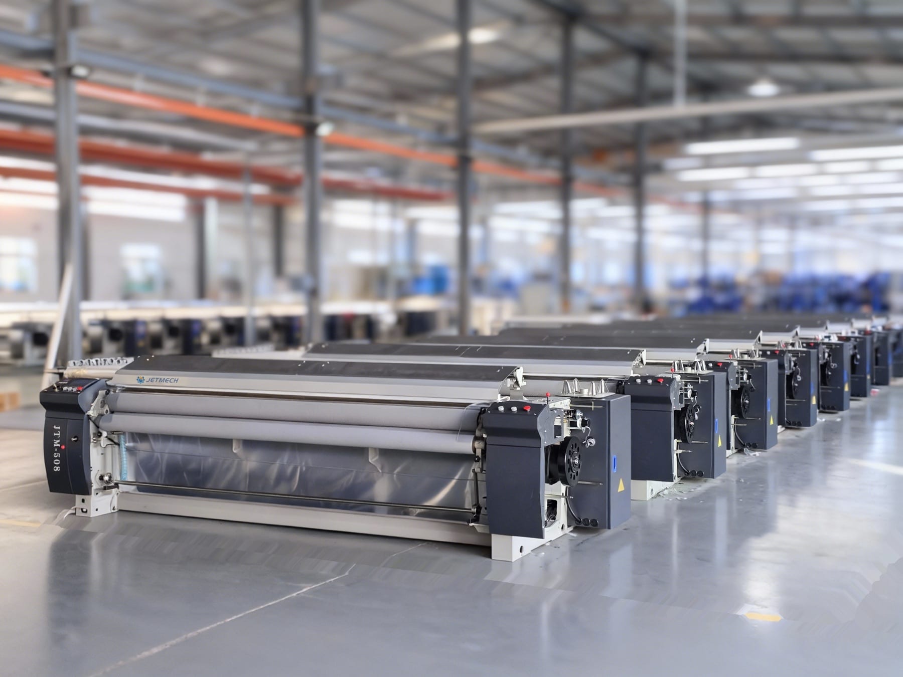 JETMECH JTM508 waterjet loom in a textile weaving workshop